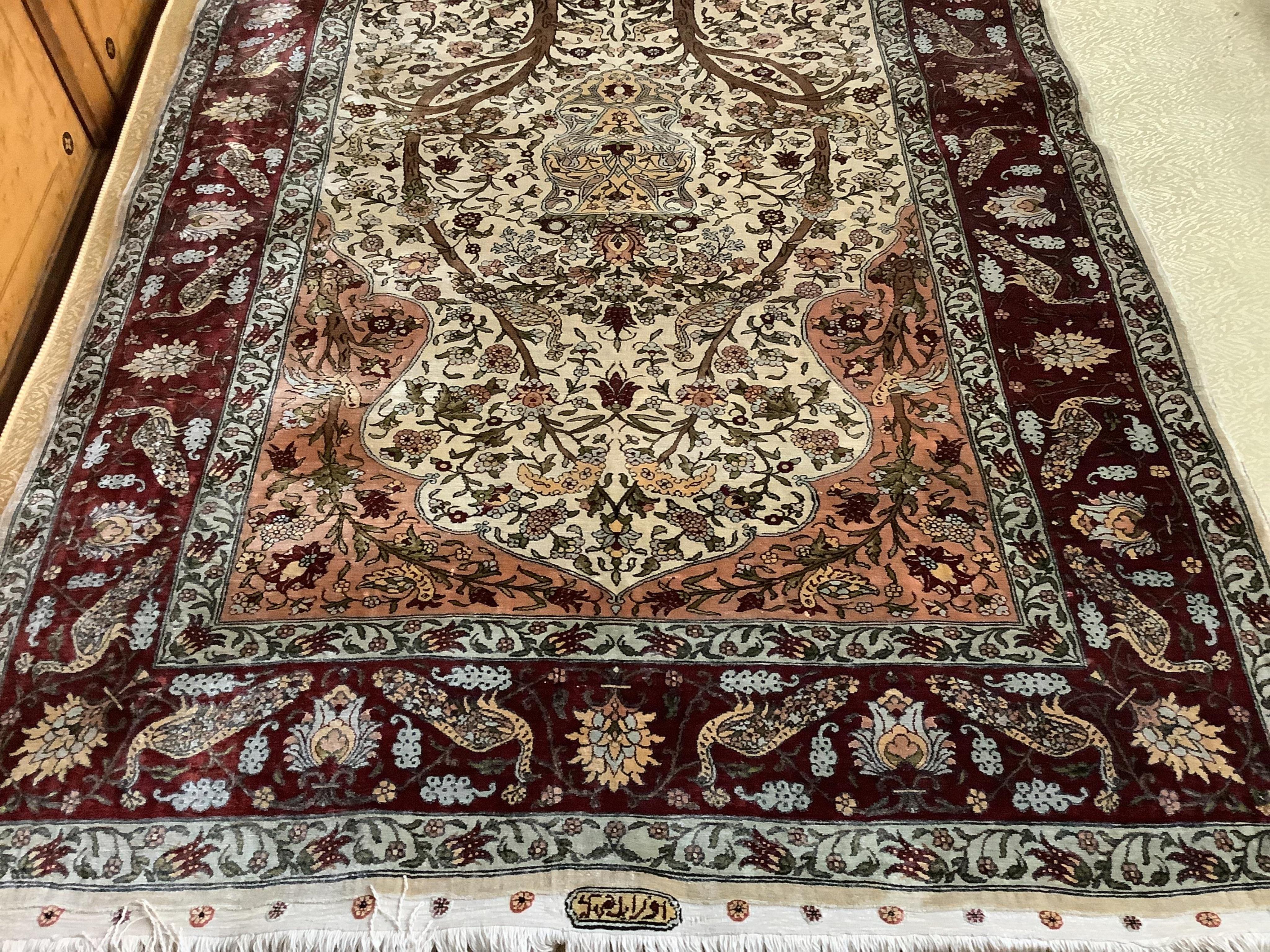 An Isfahan ivory ground part silk Tree of Life rug, 102 x 138cm. Condition - good